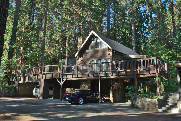 Outside view of the Big Pine cabin and trees